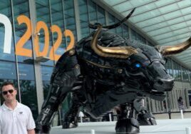 Henry Forest Posing Beside The Charging Bull